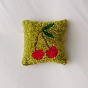 uo tufted cherry mini pillow